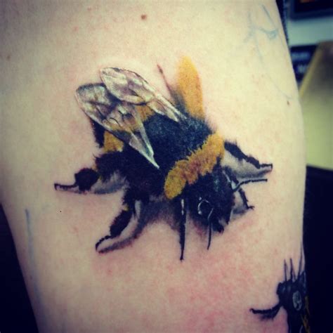 unique bumble bee tattoos.